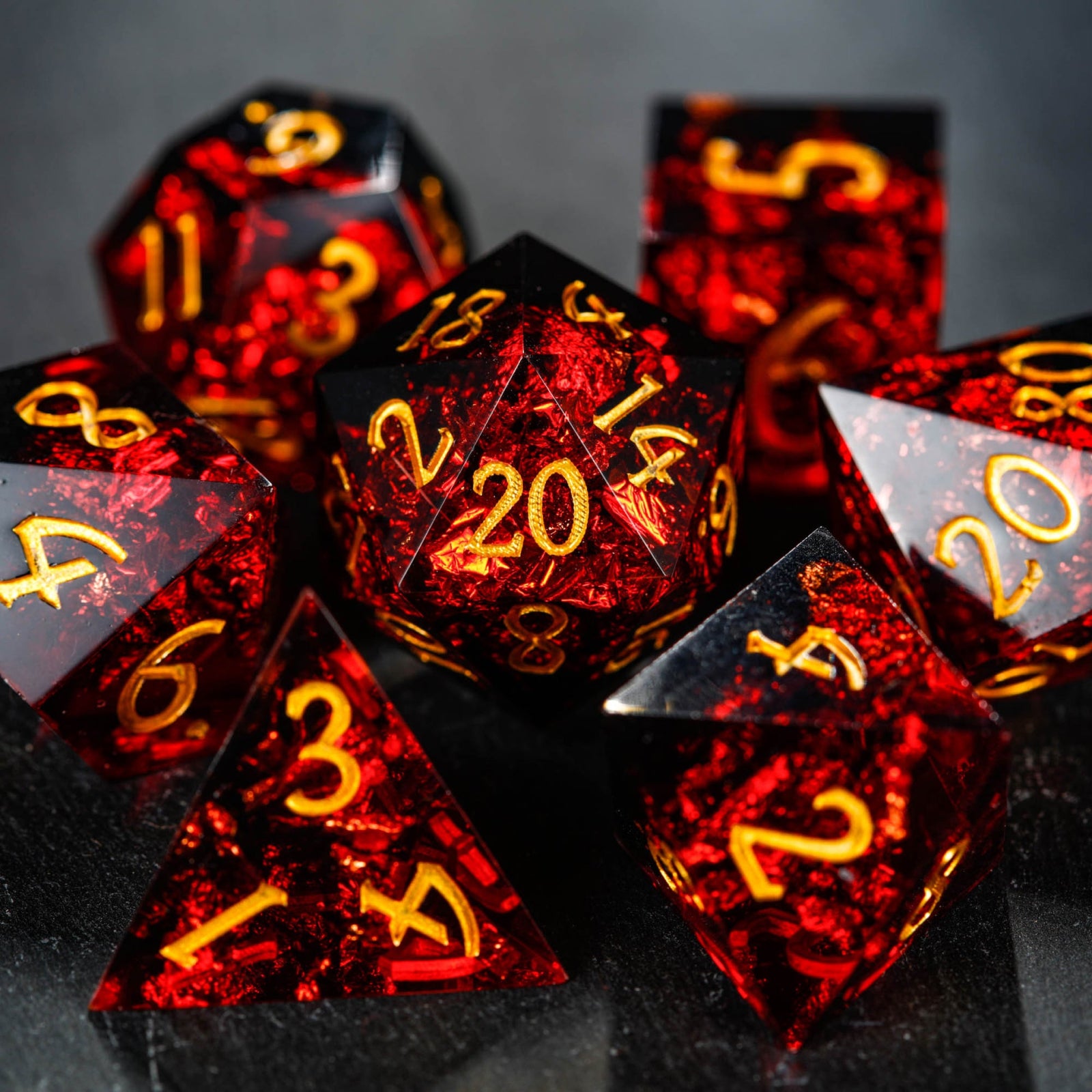 Custom-designed black and red dice for DnD